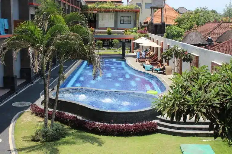 Building and pool view of Grand Sinar Indah Hotel Kuta Bali. - budget hotels in Kuta with pool