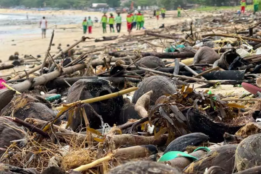 trash on seminyak beach bali