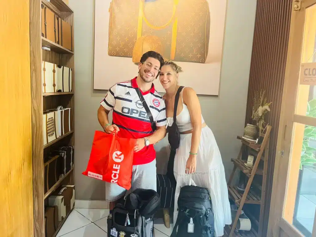photo of Hey Bali guests looking happy at the Hey Bali office after receiving a free universal adapter 