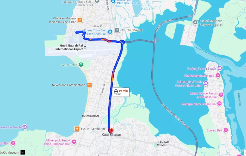 Bali Airport to Jimbaran Transfer route map showing a quick transfer time. The map displays a route from I Gusti Ngurah Rai International Airport to the Kuta Selatan/Jimbaran area, estimated to take 19 minutes and covering a distance of 7.3 km. The route utilizes parts of Jalan Uluwatu and bypasses the main airport area, confirming that Jimbaran is one of the closest major destinations to the airport.
