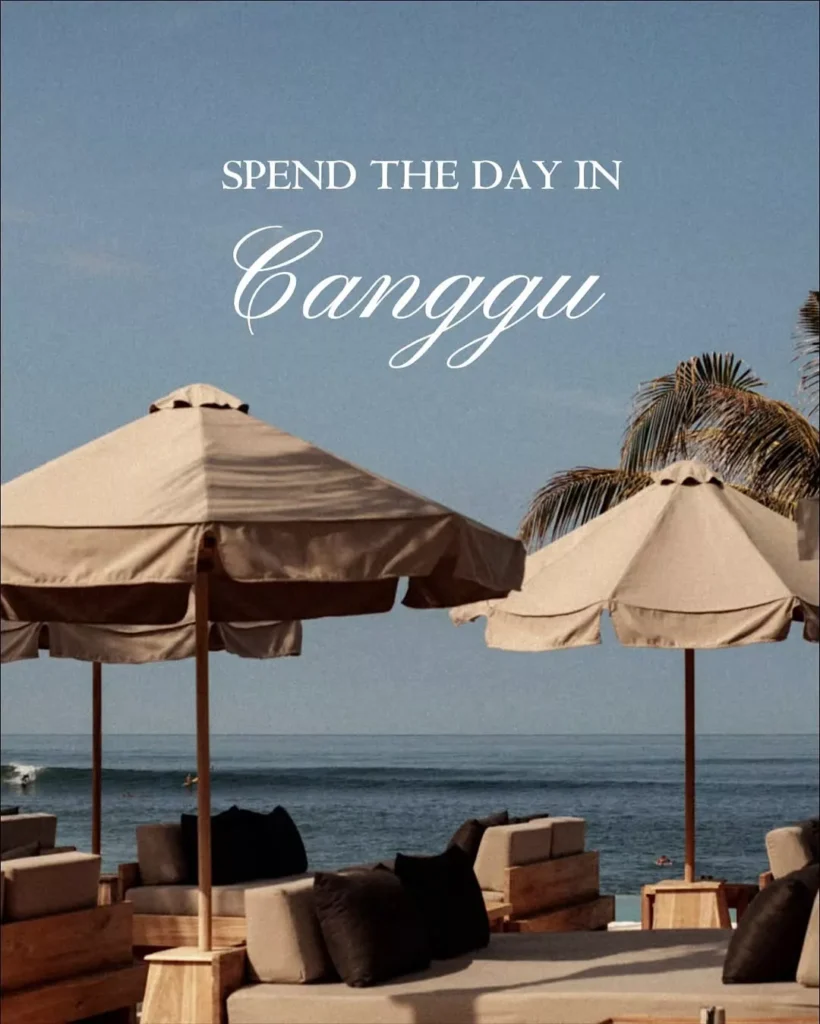 Beach loungers and umbrellas by the ocean in Bali 